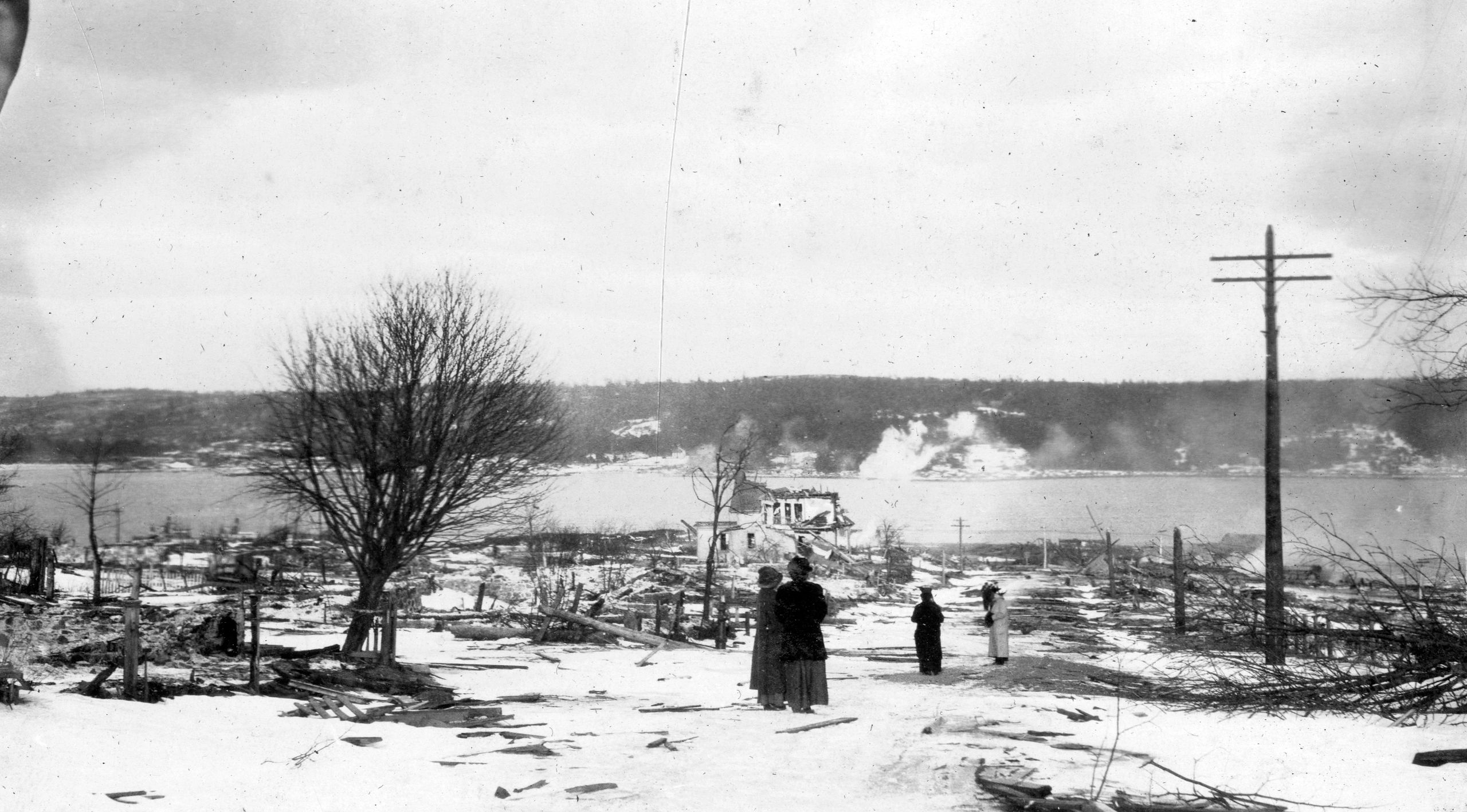 John Muir McKinlay, of Woodstock, NB, took this photo of Halifax soon after the 1917 explosion which levelled much of the city. Eagle-eyed Backyard History readers might recognize his name; his photos were included in the story about Trotsky in the Amherst Internment Camp, and in the article about the Siberian Expedition. He took all of the photos included in this article, except for the first one of Clara Dennis, which she took herself. (Provincial Archives of New Brunswick P827-MS1-220)