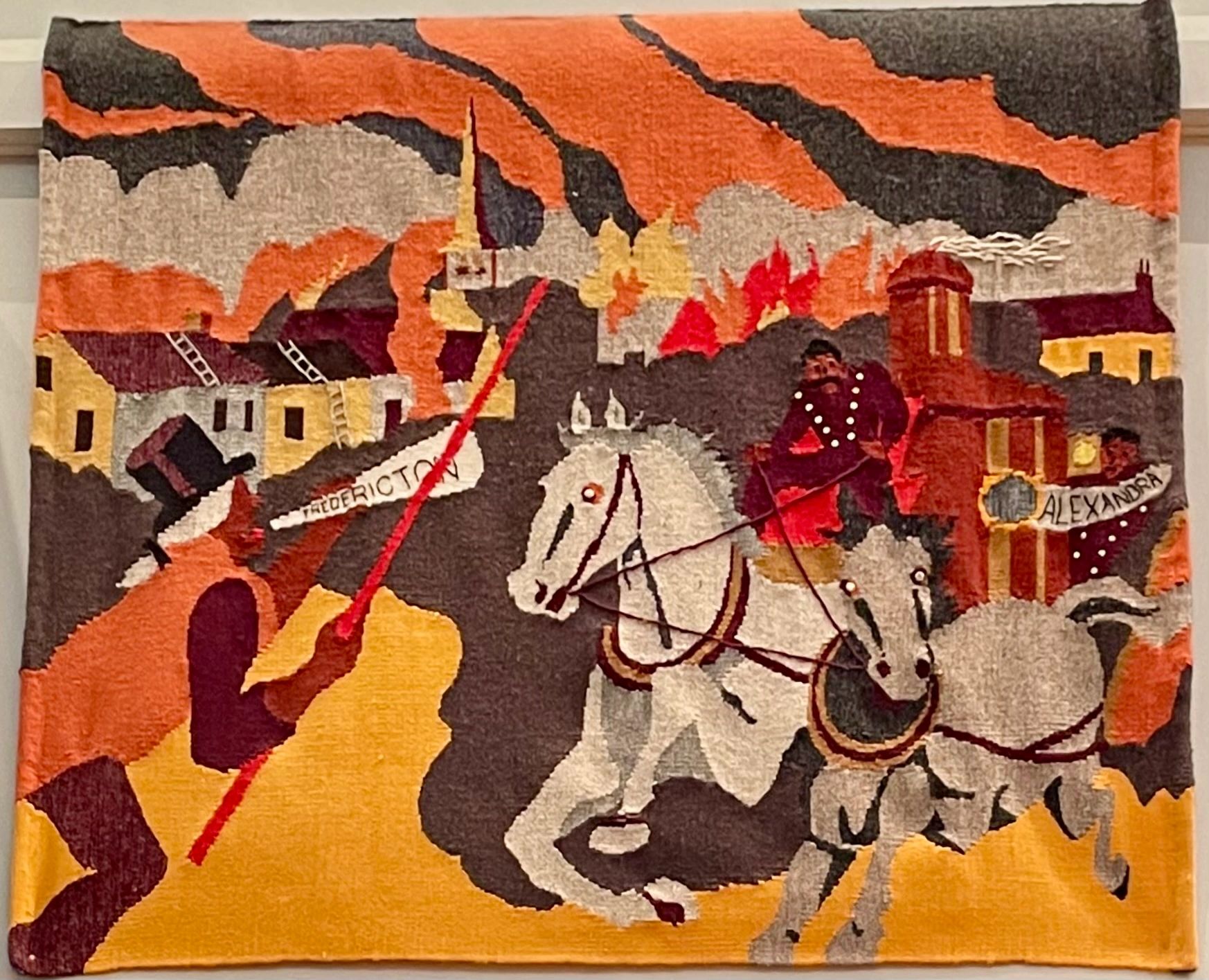 This tapestry depicting the Great Fire of Fredericton today hangs in Fredericton's City Hall, in the council chambers. (Or, at least it did when I took this photo of it back in 2021. I reached out to multiple officials to try and get a better photo, but, strangely enough, they refused. So maybe it's no longer there, or maybe there's some secret to it, but as far as I know, it's still there.)