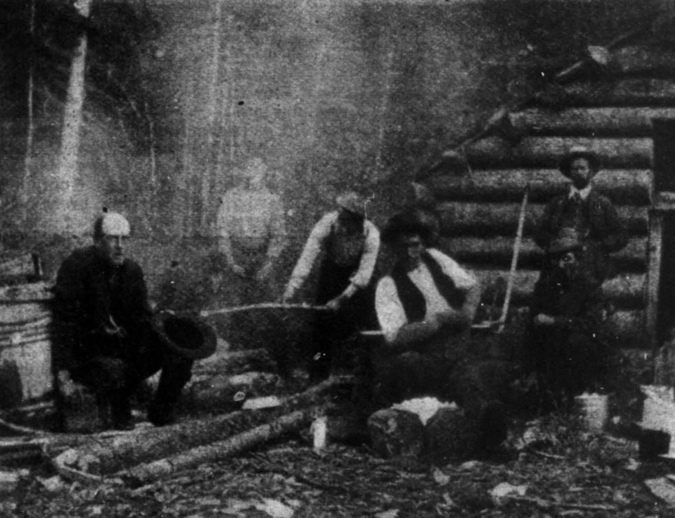 The photograph of The Dungarvon Whooper. He is the one onthe far right, with no hat on.