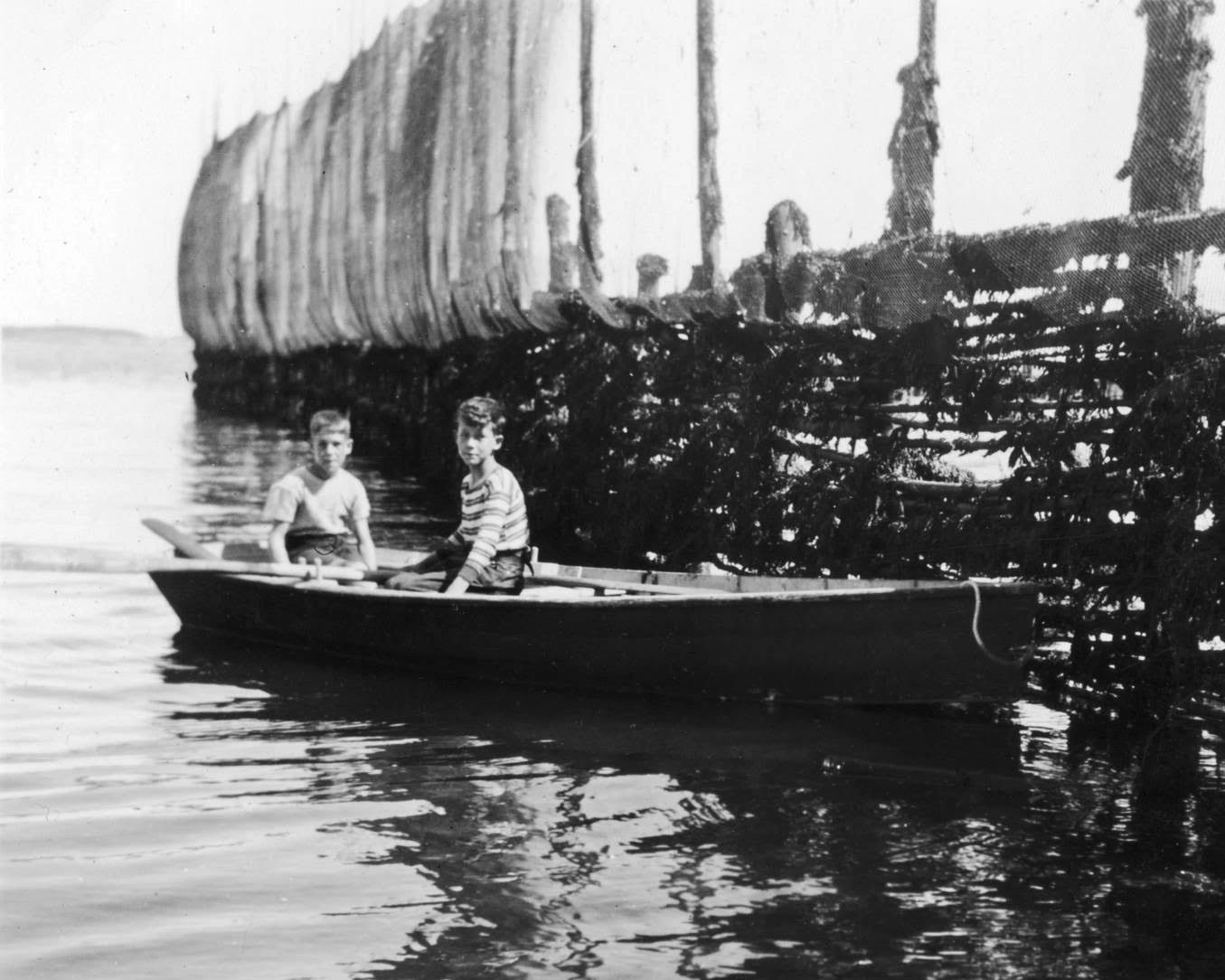 Young boys near a Deer Island fishing weir in 1949. (Provincial Archives of New Brunswick P703\13)