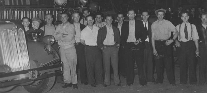 Some Haligonians, such as these men, ran towards the source of the explosions in order to fight the fire before it reached the main munitions depot. (Halifax Municipal Archives CR6-067.9)